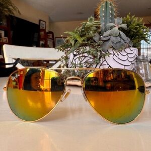 Gold Aviator Ray-Ban Sunglasses
 Yellow reflective Lenses